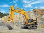 New Komatsu Excavator waiting in quarry